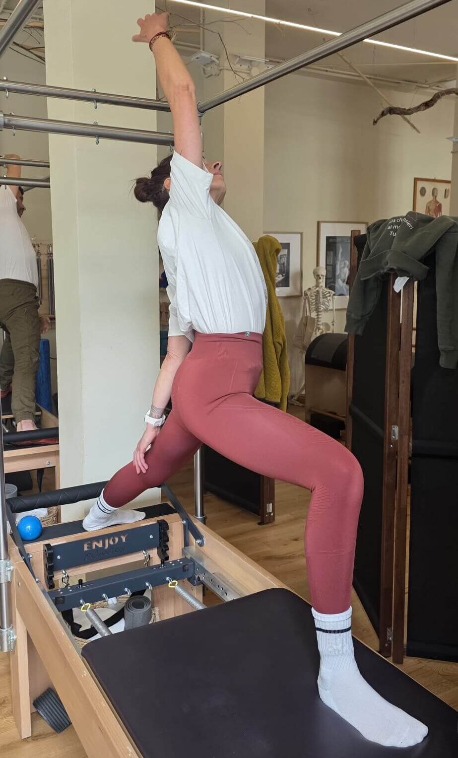 Esercizio su Reformer presso Respira Studio Pilates, Reformer Studio Parma